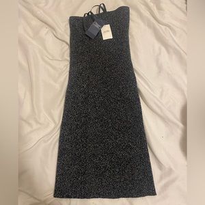abecrombie dress material is knit, stretchy so could fit up to size medium